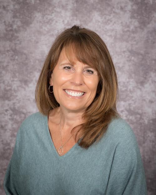 Woman smiling.