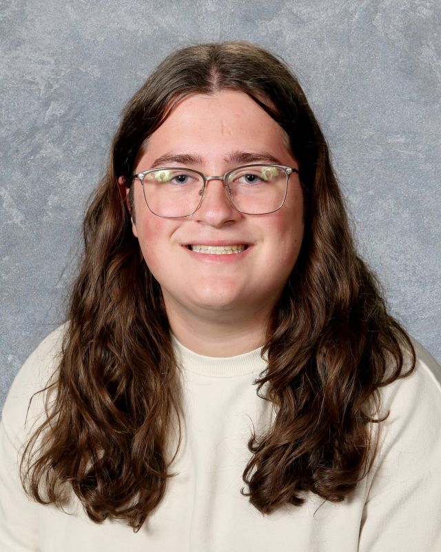 Smiling teen wearing glasses